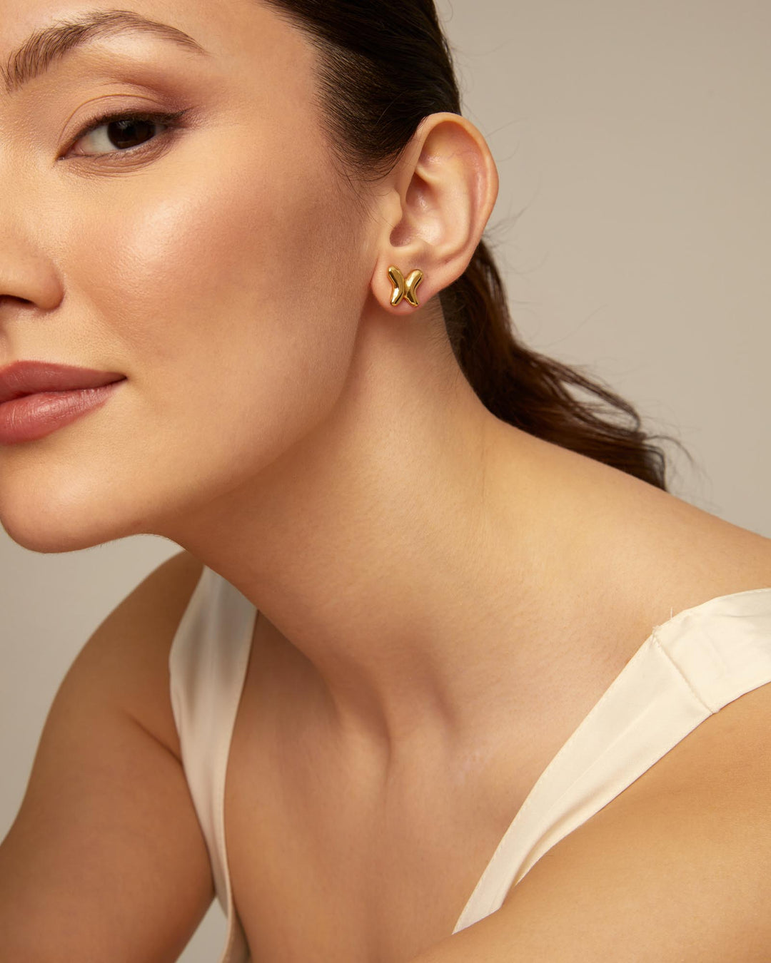 UNOde50 Gold Butterfly Effect Earrings