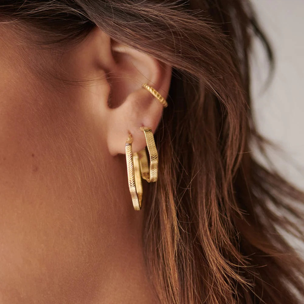 Daisy London Gold Midi Wavy Snake Hoop Earrings