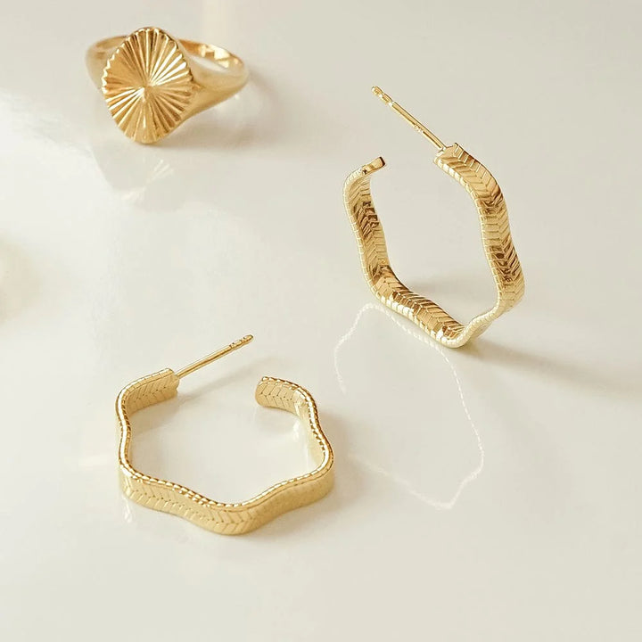 Daisy London Gold Midi Wavy Snake Hoop Earrings